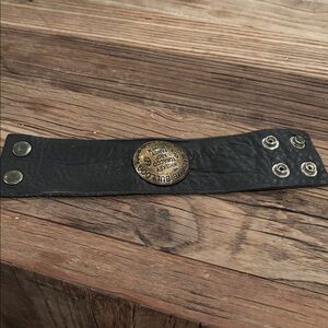 Black Leather Bracelet with Gold Medallion